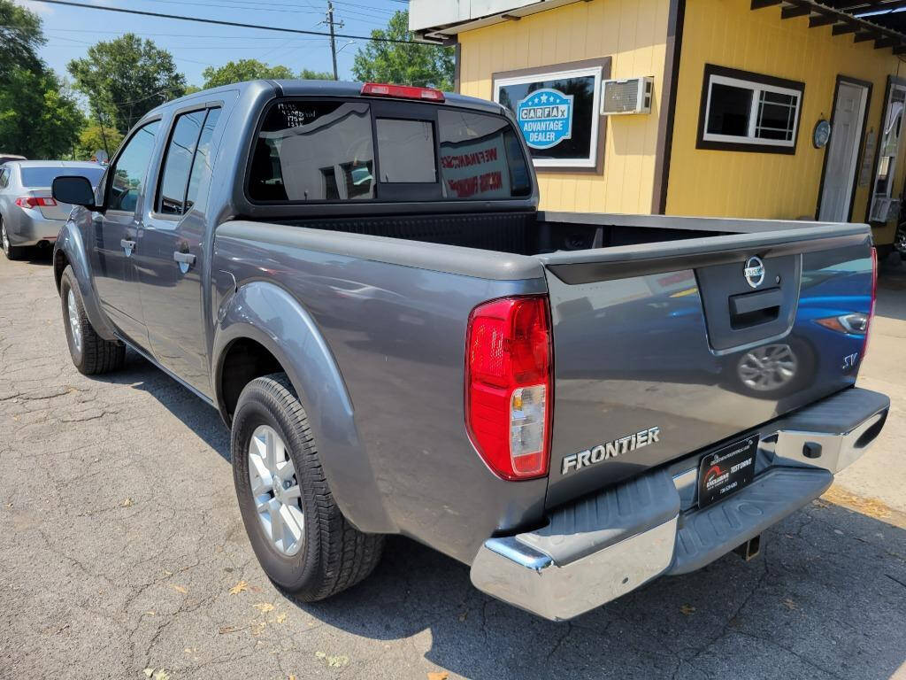 2016 Nissan Frontier for sale at DAGO'S AUTO SALES LLC in Dalton, GA