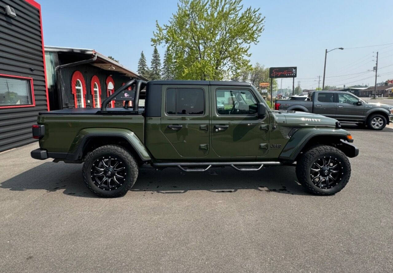 2022 Jeep Gladiator for sale at SIGNATURE AUTOS LLC in Weston, WI