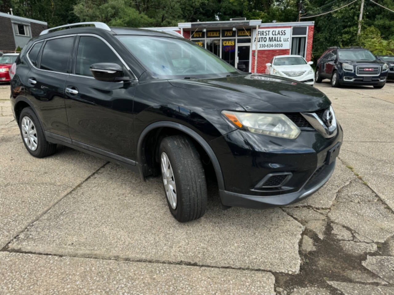 2015 Nissan Rogue for sale at First Class Auto Mall in Akron, OH