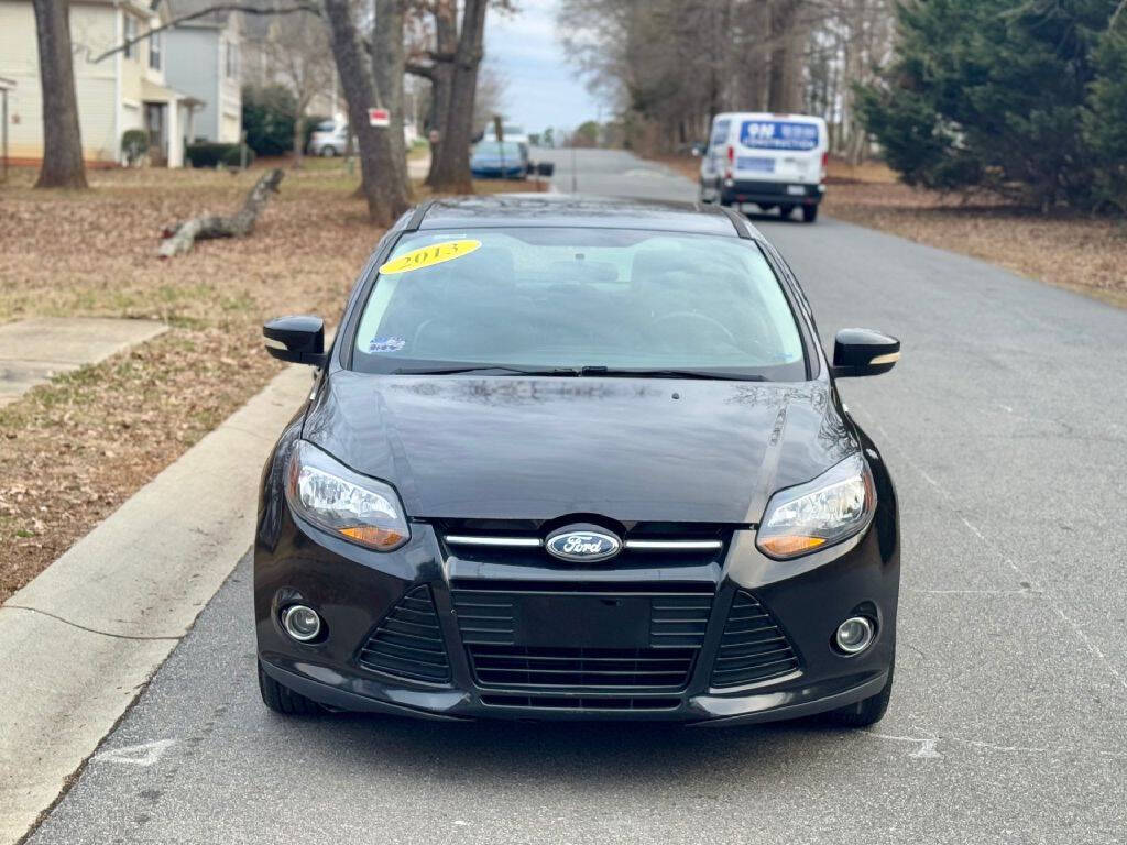 Black 2013 Ford Focus Titanium Titanium 4dr Hatchback 2