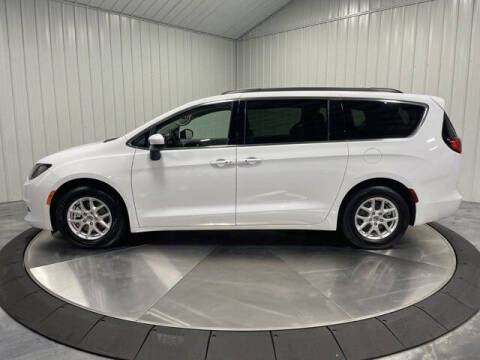 2021 Chrysler Voyager for sale at HILAND TOYOTA in Moline IL