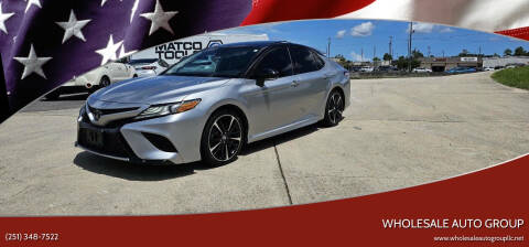 2019 Toyota Camry for sale at WHOLESALE AUTO GROUP in Mobile AL