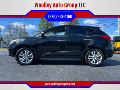 2012 Hyundai Tucson for sale at Woolley Auto Group LLC in Poland OH