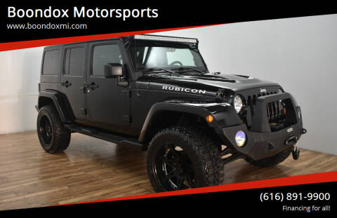 2013 Jeep Wrangler Unlimited for sale at Boondox Motorsports in Caledonia MI