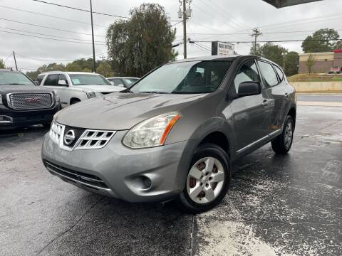 2013 Nissan Rogue for sale at Magic Motors Inc. in Snellville GA