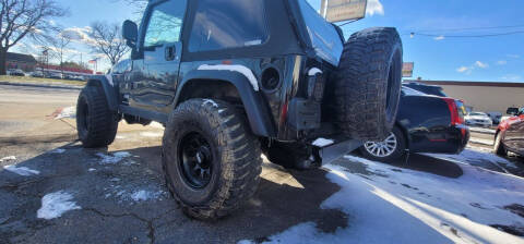 2003 Jeep Wrangler for sale at J & J Used Cars inc in Wayne MI