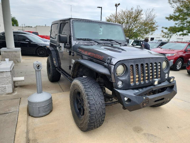 2016 Jeep Wrangler for sale at HONDA DE MUSKOGEE in Muskogee OK