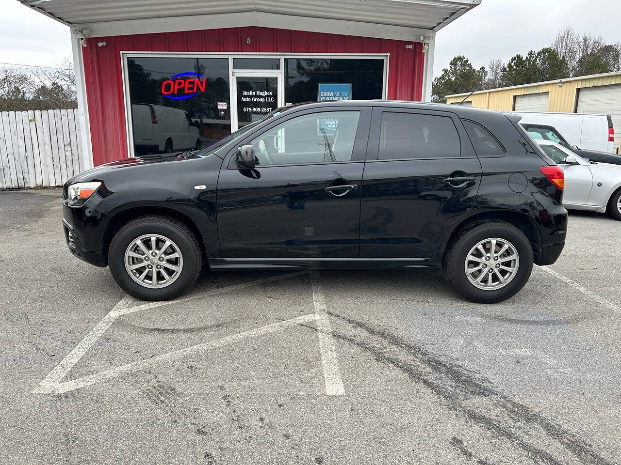 2012 Mitsubishi Outlander Sport for sale at Justin Hughes Auto Group LLC in Douglasville, GA