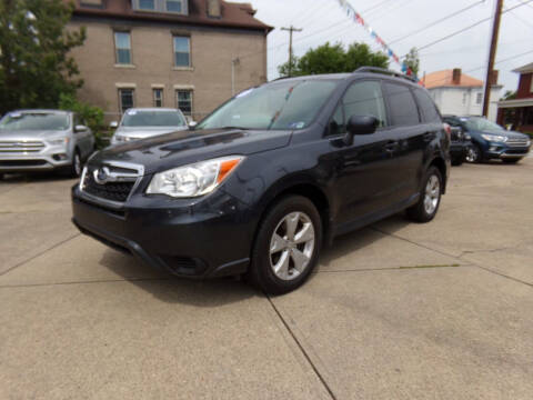 2015 Subaru Forester for sale at Henrys Used Cars in Moundsville WV