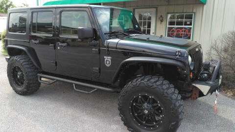 2011 Jeep Wrangler Unlimited for sale at Haigler Motors Inc in Tyler TX