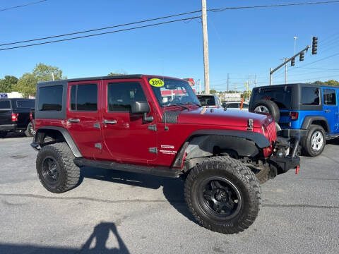 2013 Jeep Wrangler Unlimited for sale at CarTime in Rogers AR