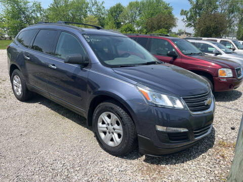 2014 Chevrolet Traverse for sale at HEDGES USED CARS in Carleton MI