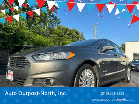 2014 Ford Fusion Hybrid for sale at Auto Outpost-North, Inc. in McHenry IL