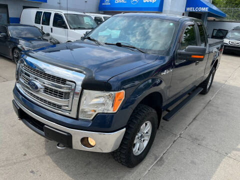 2013 Ford F-150 for sale at Alpha Group Car Leasing in Redford MI