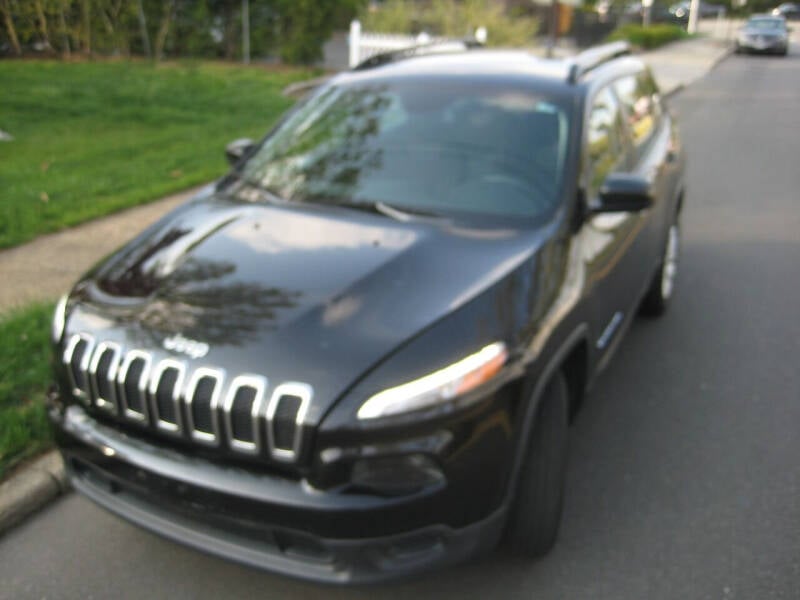 2016 Jeep Cherokee for sale at Top Choice Auto Inc in Massapequa Park NY