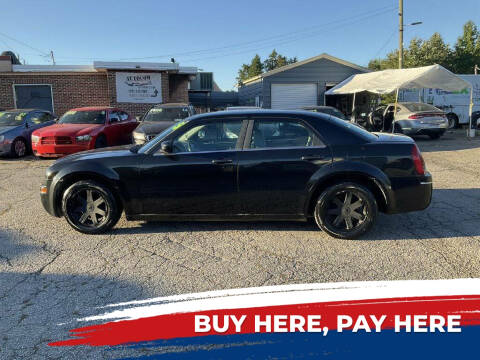 2005 Chrysler 300 for sale at Autocom, LLC in Clayton NC