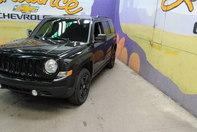 Used 2014 Jeep Patriot Latitude with VIN 1C4NJRFB9ED852640 for sale in Grand Ledge, MI