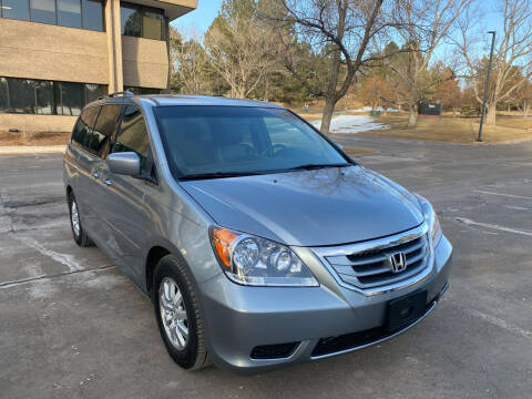 2010 Honda Odyssey for sale at QUEST MOTORS in Englewood CO