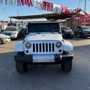 2011 Jeep Wrangler Unlimited for sale at M&M Diamond Cars LLC in Phoenix AZ