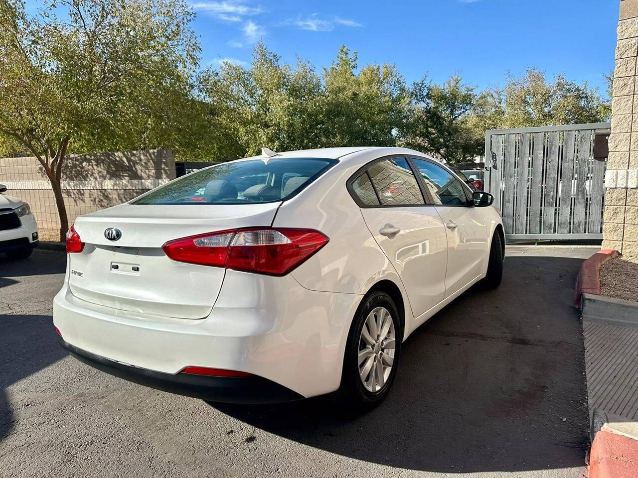 2016 Kia Forte for sale at HUDSONS AUTOS in Gilbert, AZ