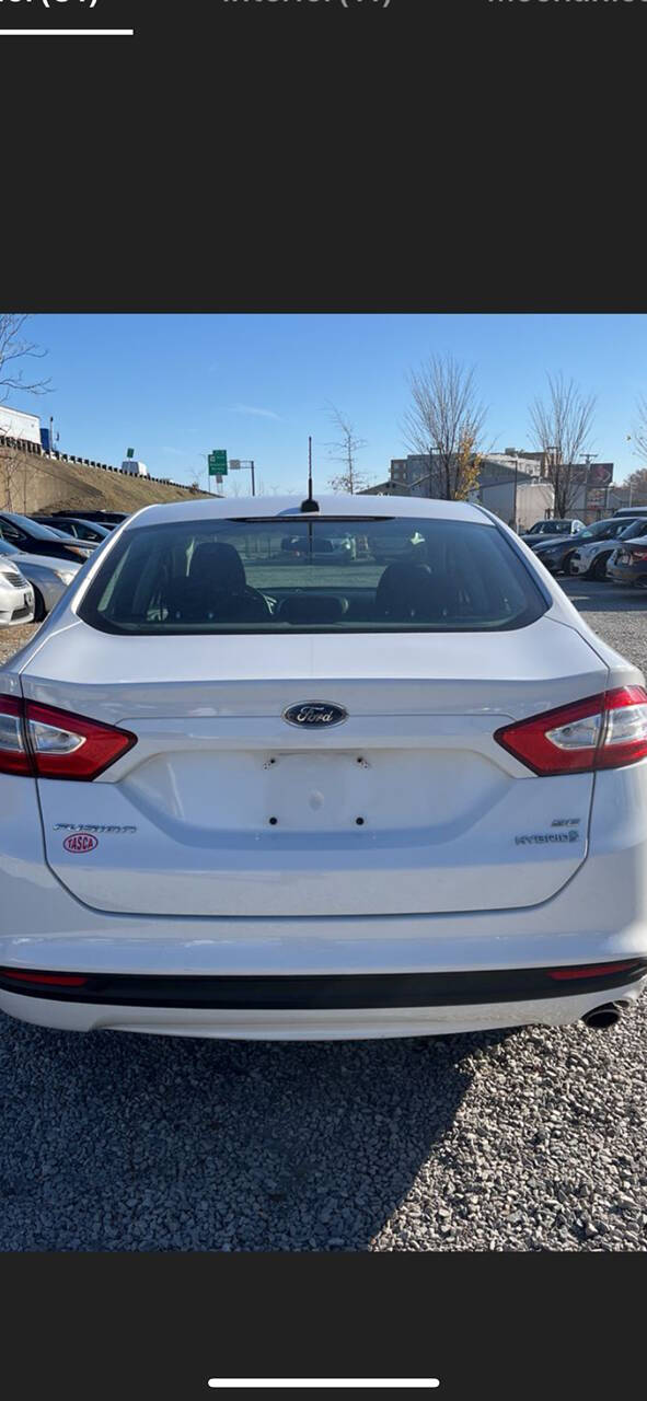 2013 Ford Fusion Hybrid for sale at Heavenly Touch Auto Sales Inc in Middletown, NY