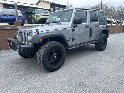 2014 Jeep Wrangler Unlimited for sale at WORKMAN AUTO INC in Bellefonte PA