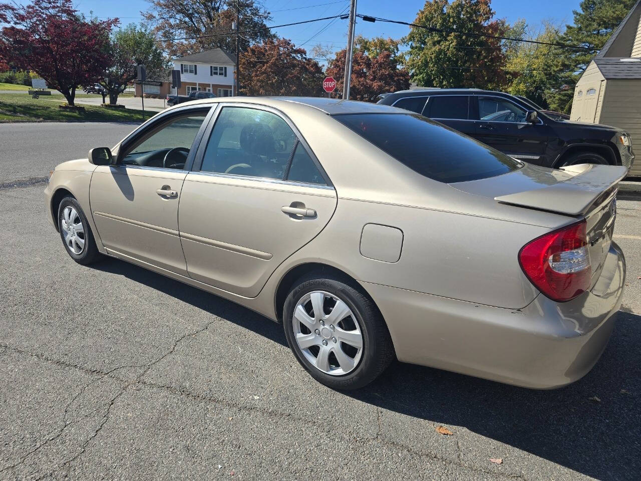 2004 Toyota Camry for sale at QUEENSGATE AUTO SALES in York, PA