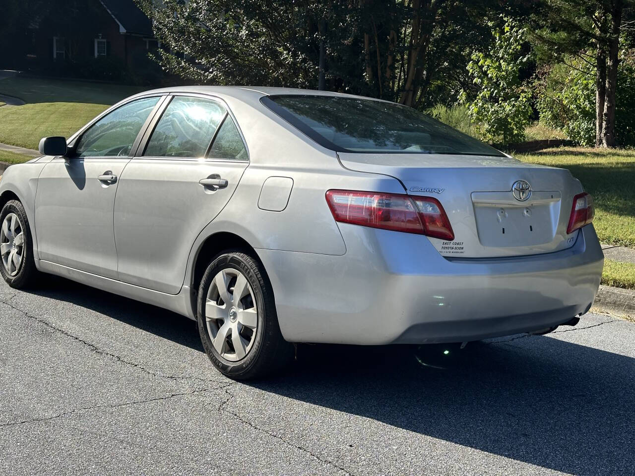 2009 Toyota Camry for sale at SHURE AUTO SALES in Snellville, GA