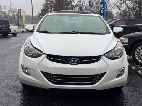 2013 Hyundai Elantra for sale at DISTINCT AUTO GROUP LLC in Kent OH