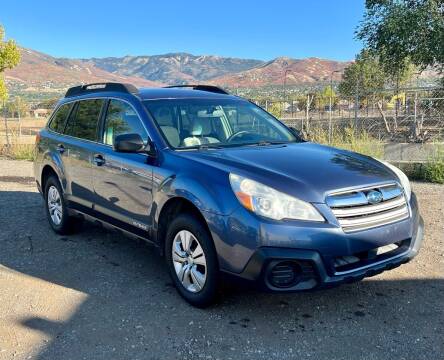 2013 Subaru Outback for sale at The Car-Mart in Murray UT