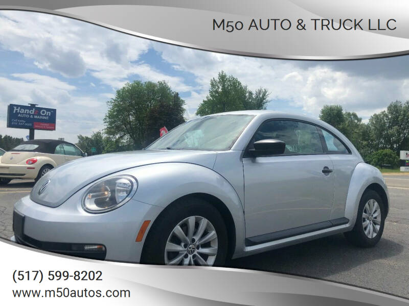 2013 Volkswagen Beetle for sale at Icon Auto Group in Lake Odessa MI