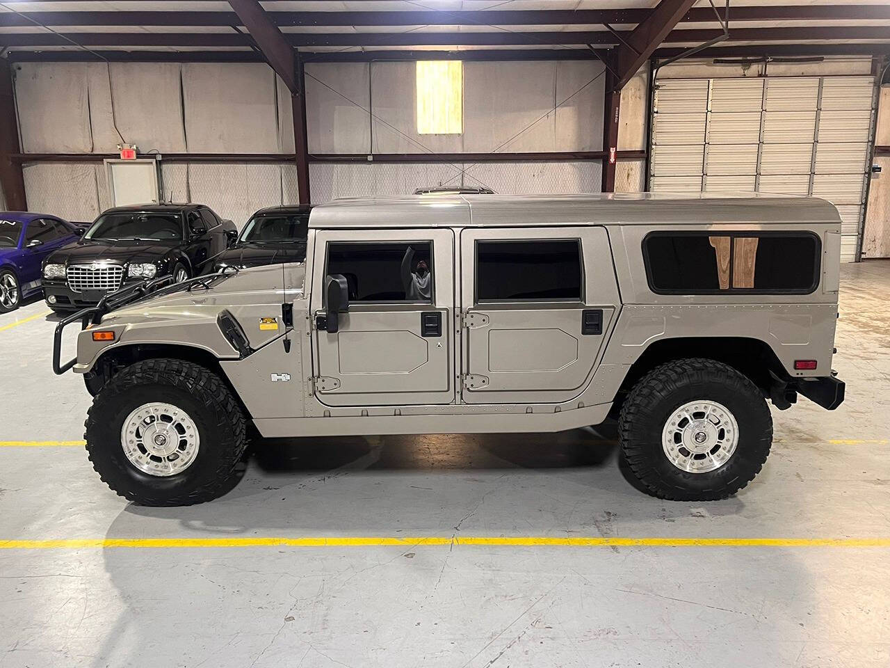 2003 HUMMER H1 for sale at Carnival Car Company in Victoria, TX