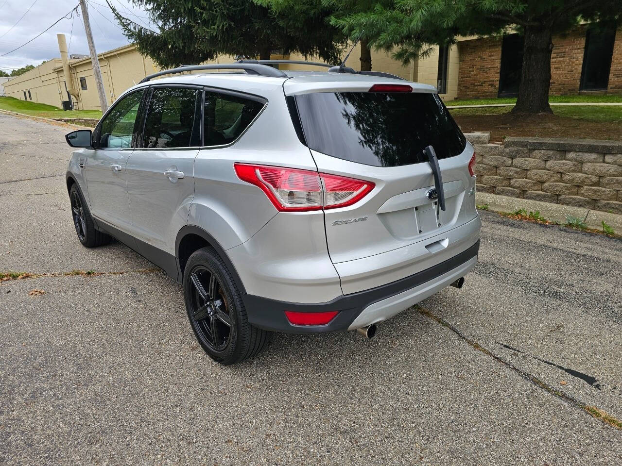 2013 Ford Escape for sale at WAGNER AUTO MART LLC in Ann Arbor, MI