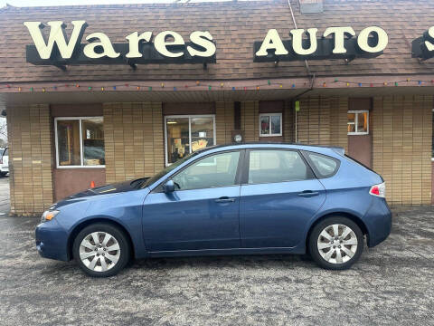 2011 Subaru Impreza for sale at Wares Auto Sales INC in Traverse City MI