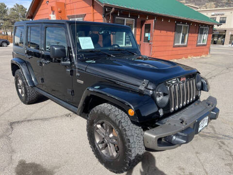2017 Jeep Wrangler Unlimited for sale at BERKENKOTTER MOTORS in Brighton CO