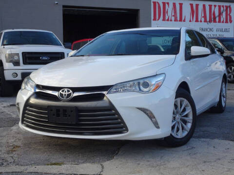 2016 Toyota Camry for sale at Deal Maker of Gainesville in Gainesville FL