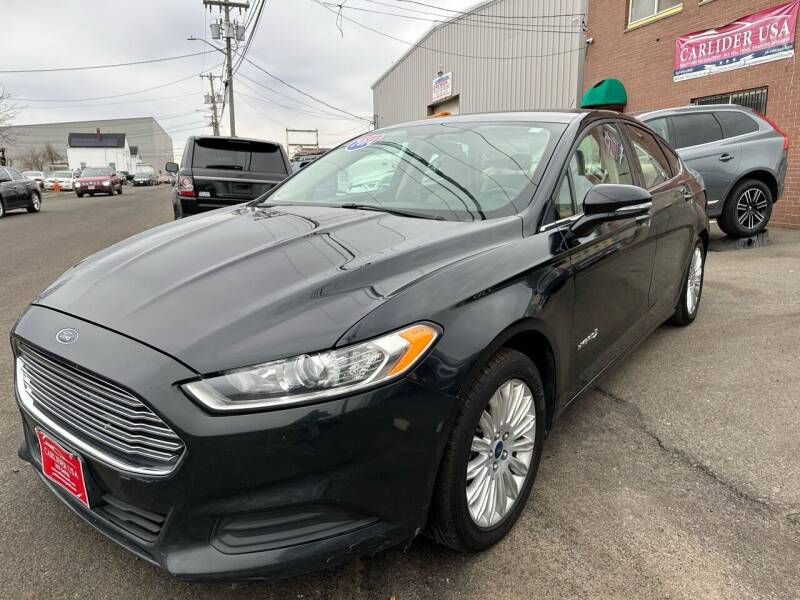 2014 Ford Fusion Hybrid for sale at Carlider USA in Everett MA