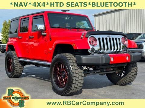 2016 Jeep Wrangler Unlimited for sale at R & B CAR CO in Fort Wayne IN