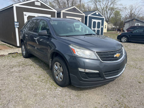 2013 Chevrolet Traverse for sale at HEDGES USED CARS in Carleton MI