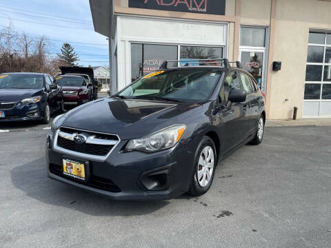 2014 Subaru Impreza for sale at ADAM AUTO AGENCY in Rensselaer NY