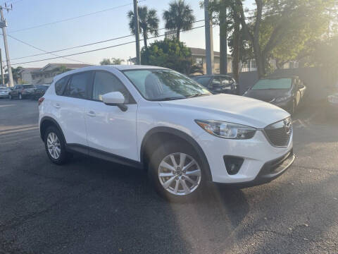 2013 Mazda CX-5 for sale at PHIL SMITH AUTOMOTIVE GROUP - Phil Smith Kia in Lighthouse Point FL