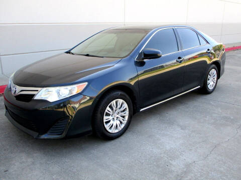 2014 Toyota Camry for sale at Reynolds Auto Group in Plano TX