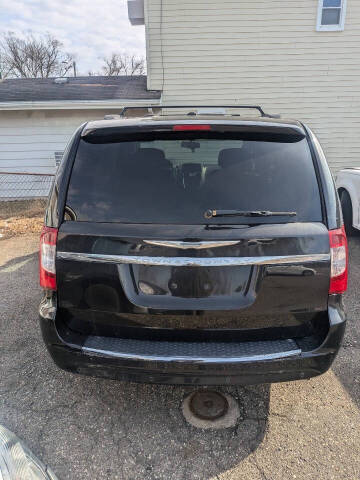 2014 Chrysler Town and Country for sale at FIRST CLASS IMPORTS AUTO SALES in Ypsilanti MI