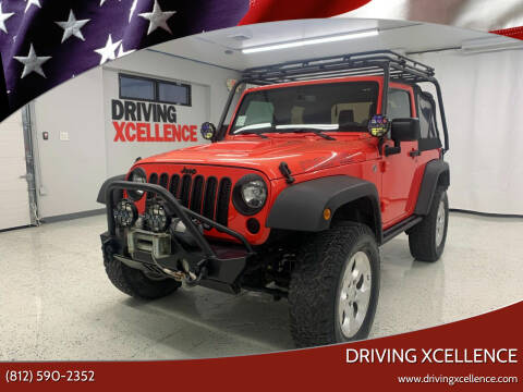 2013 Jeep Wrangler for sale at Driving Xcellence in Jeffersonville IN