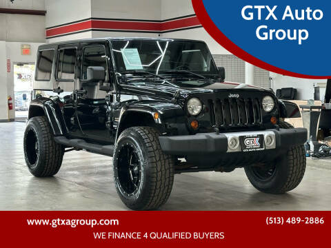 2011 Jeep Wrangler Unlimited for sale at UNCARRO in West Chester OH