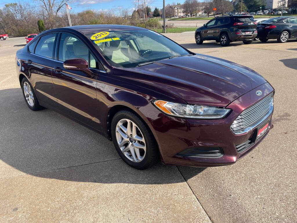 2013 Ford Fusion for sale at Martinson's Used Cars in Altoona, IA