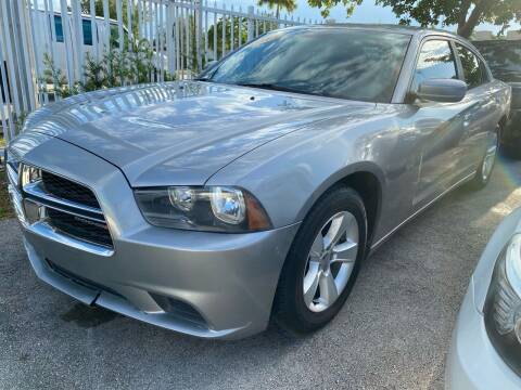 2013 Dodge Charger for sale at Plus Auto Sales in West Park FL