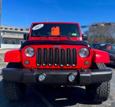 2012 Jeep Wrangler Unlimited for sale at Steel Auto Group LLC in Logan OH