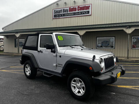 2012 Jeep Wrangler for sale at Smart Buy Auto Center in Aurora IL