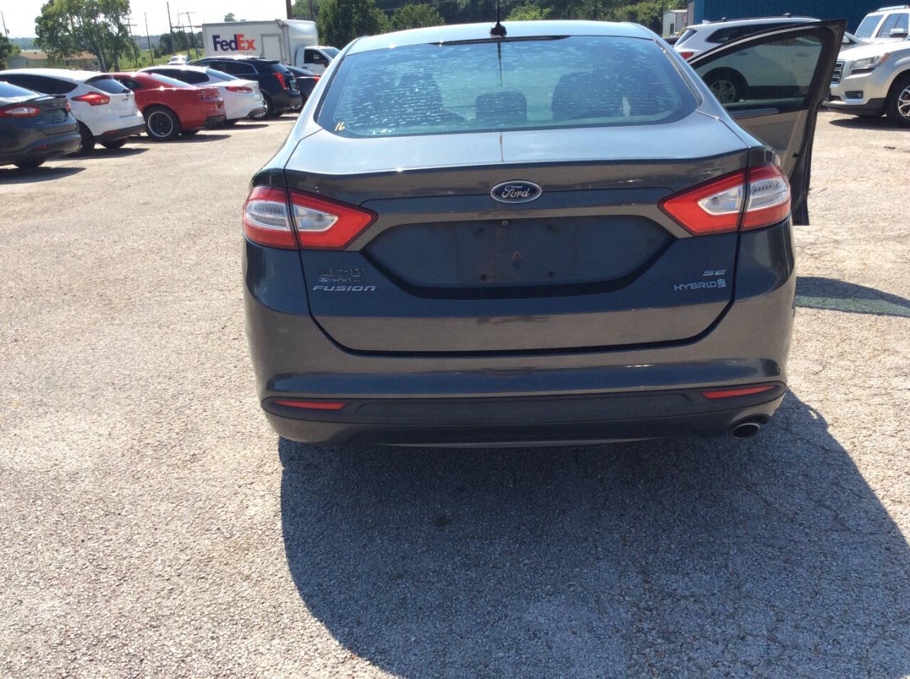 2016 Ford Fusion Hybrid for sale at SPRINGTIME MOTORS in Huntsville, TX